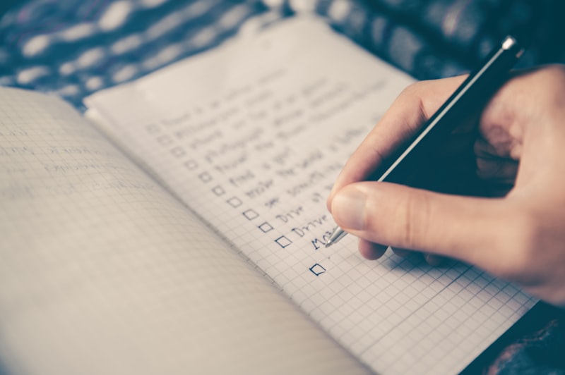 Personalised wellness planning notes and a structured protocol checklist on a clean work surface