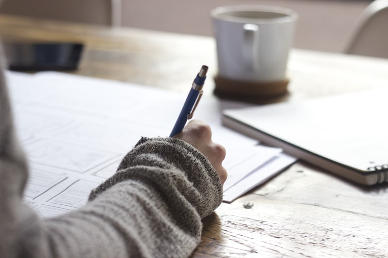 Calendar and review notes representing a scheduled monthly progress check-in and follow-up session